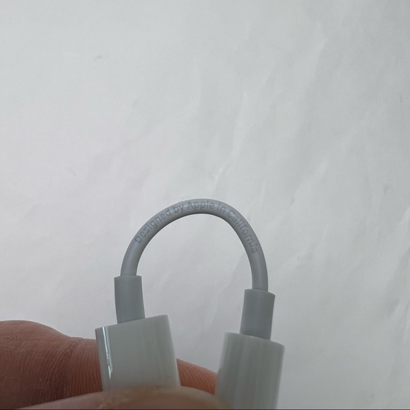 Never Used - Apple Adapter - 3.5mm headphone jack to lightning port adapter - Picture 3 of 4